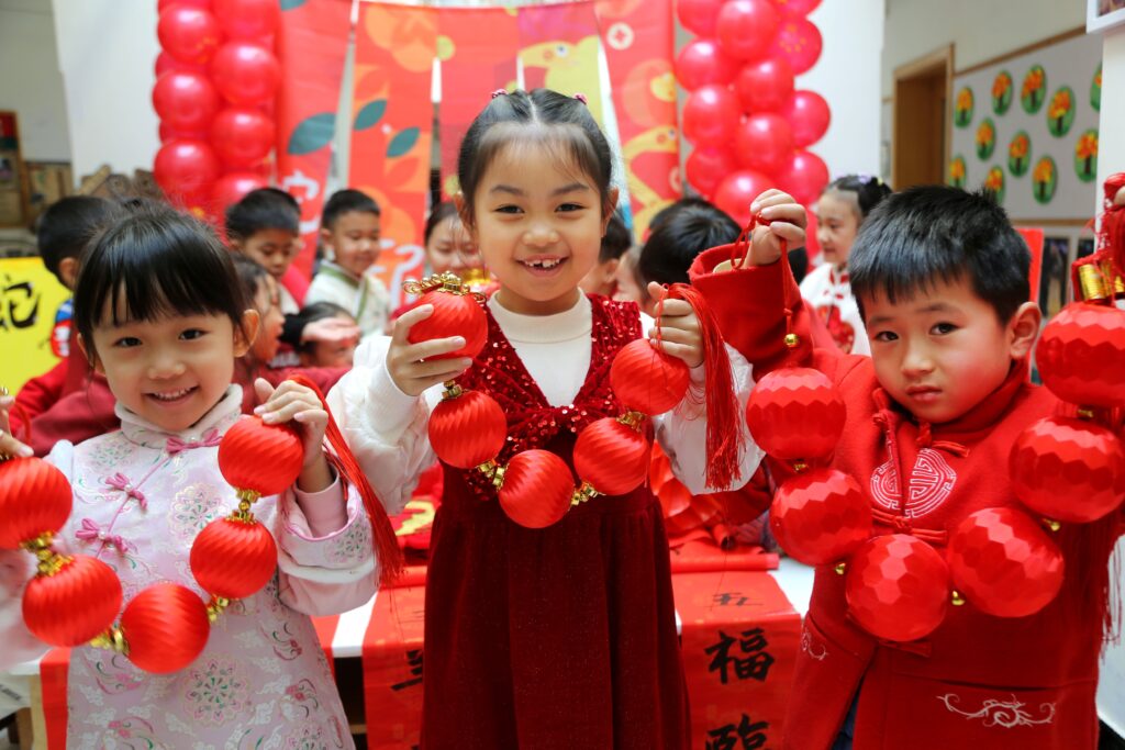 LIANYUNGANG, CHINA - JANUARY 21, 2025 - Children show New Year ornaments made by themselves in Lianyungang city, Jiangsu province, China, Jan 21, 2025. (Photo by CFOTO/Sipa USA)