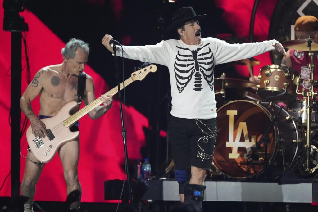 Flea, left, and Anthony Kiedis of Red Hot Chili Peppers perform during the FireAid benefit concert