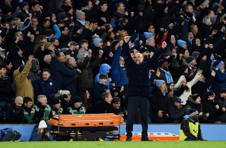 Manchester City manager Pep Guardiola celebrates their third goal scored by Manchester City's Phil Foden.