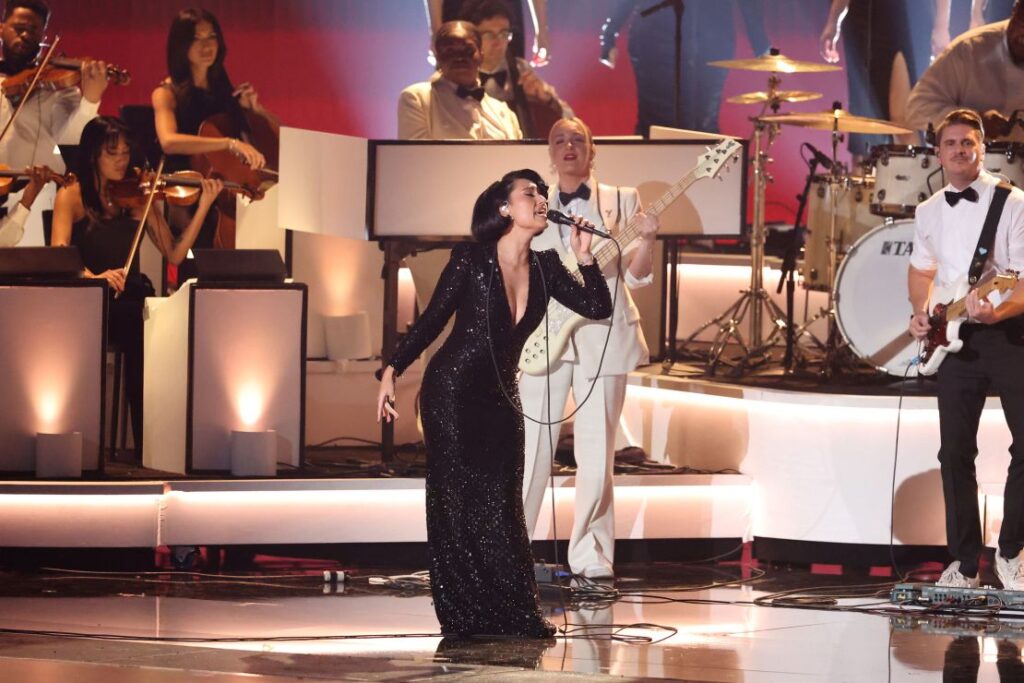 Raye performs onstage during the Grammy Awards in Los Angeles on Sunday.