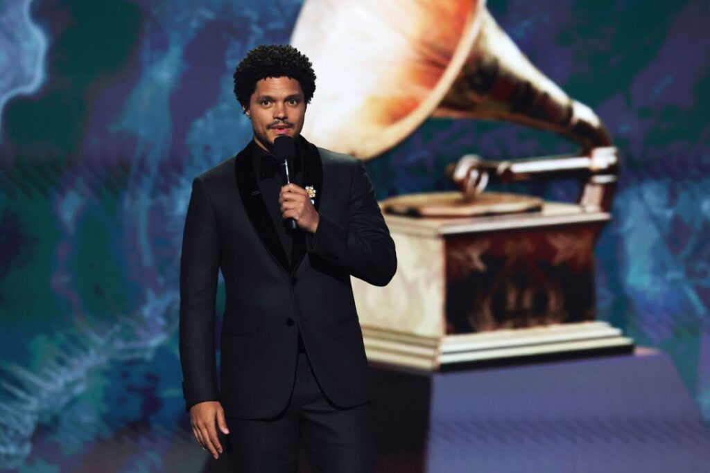 Trevor Noah speaks onstage during the Grammy Awards in Los Angeles on Sunday.